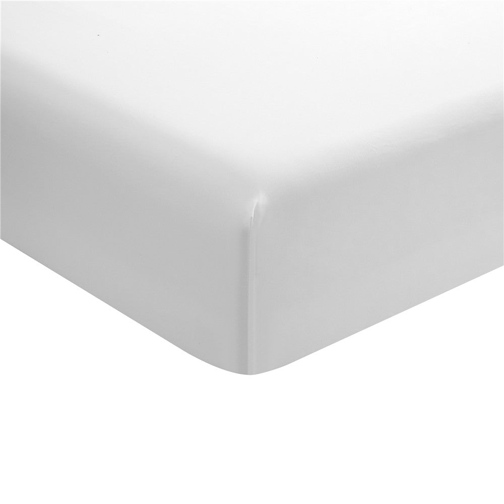Close-up of white microfiber fitted sheet snugly wrapped around a mattress corner, showcasing smooth wrinkle-free texture and deep pocket fit